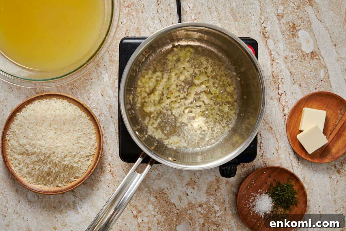 Garlic Butter Rice Recipe: Fluffy, Flavorful Side Dish 4 pot on a stove with garlic and butter being saute'd and melted