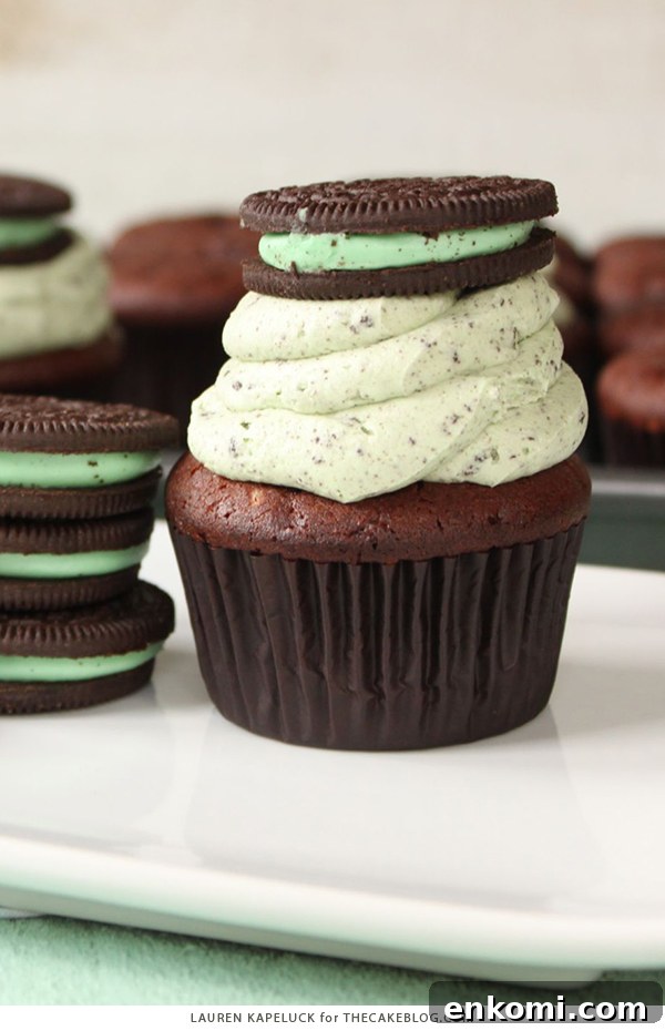 Mint Cookies and Cream Cupcakes Recipe for Refreshing Dessert 5 Mint Cookies 'N Cream Cupcakes with cookies in the cake and in the frosting | by Lauren Kapeluck for TheCakeBlog.com