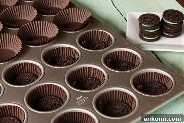 Mint Cookies and Cream Cupcakes Recipe for Refreshing Dessert 6 Mint Cookies 'N Cream Cupcakes with cookies in the cake and in the frosting | by Lauren Kapeluck for TheCakeBlog.com