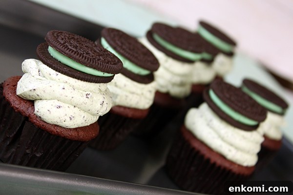 Mint Cookies and Cream Cupcakes Recipe for Refreshing Dessert 7 Mint Cookies 'N Cream Cupcakes with cookies in the cake and in the frosting | by Lauren Kapeluck for TheCakeBlog.com