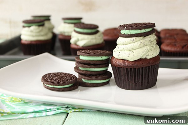 Mint Cookies and Cream Cupcakes Recipe for Refreshing Dessert 8 Mint Cookies 'N Cream Cupcakes with cookies in the cake and in the frosting | by Lauren Kapeluck for TheCakeBlog.com