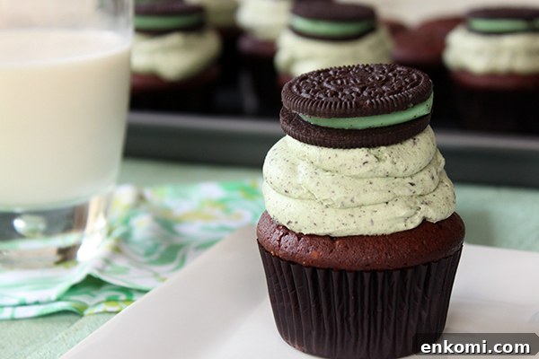 Mint Cookies and Cream Cupcakes Recipe for Refreshing Dessert 9 Mint Cookies 'N Cream Cupcakes with cookies in the cake and in the frosting | by Lauren Kapeluck for TheCakeBlog.com