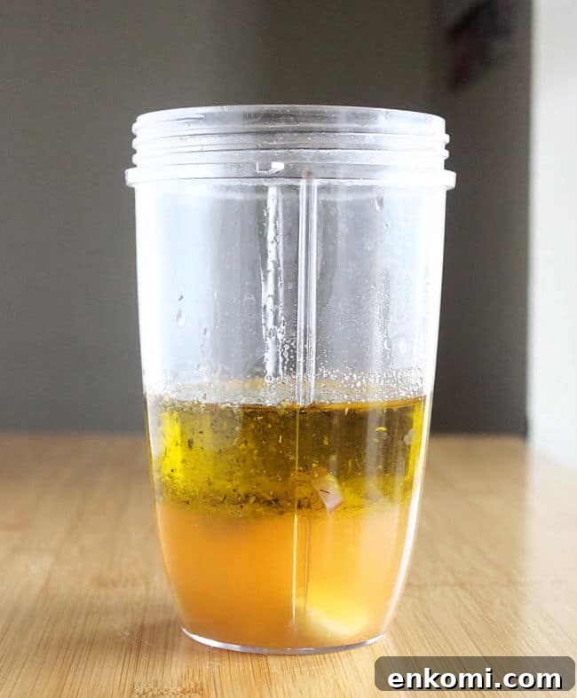 Oil and liquid in a Nutribullet blender.