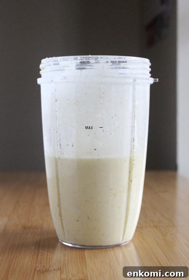 Blended salad dressing in a Nutritbullet blender.