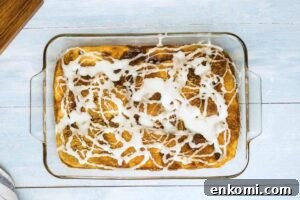 Vintage Coffee Cake Recipe for Bread Machines: Perfect Morning Bake 8 A coffee cake with a white glaze in a glass baking dish.