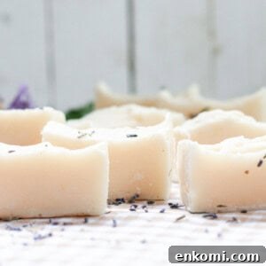 Cold process baby soap bars curing on a white table.