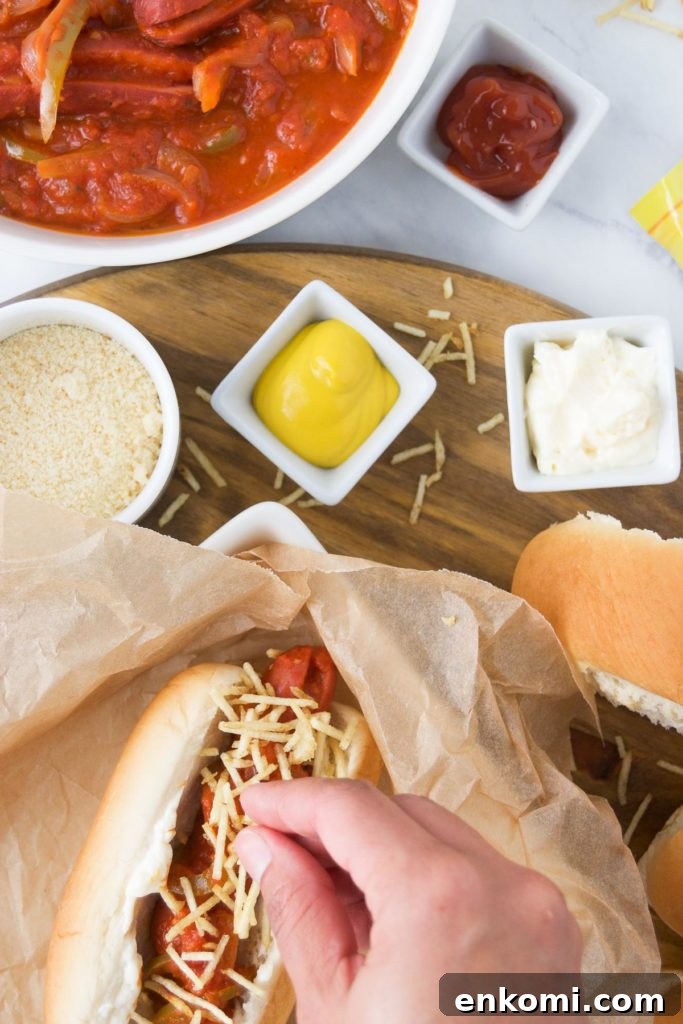 Brazilian Hot Dogs spread with sauce topped with string potato chips