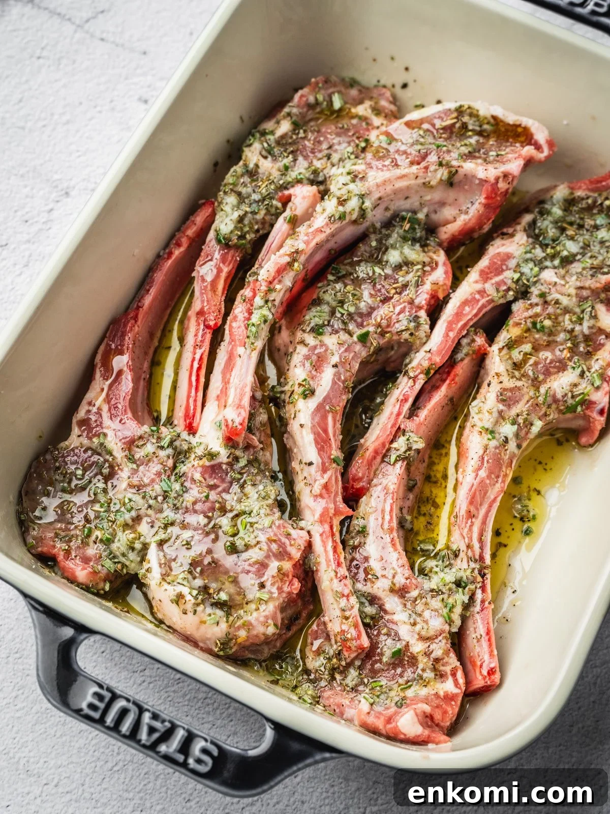 Grilled or Pan-Seared Marinated Greek Lamb Chops 6 Lamb chops in a tray seasoned with the prepared marinade.