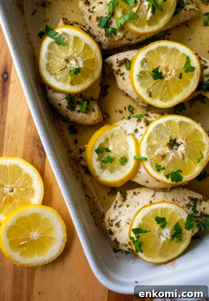 Juicy Baked Lemon-Herb Chicken Breasts for Weeknight Dinners 3 baked lemon chicken in a baking pan