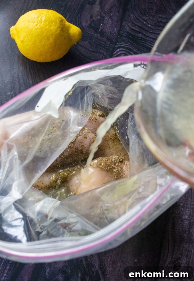 Juicy Baked Lemon-Herb Chicken Breasts for Weeknight Dinners 6 lemon marinade ingredients in a zip top bag