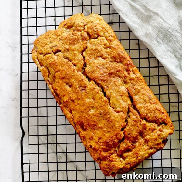 Low-Sugar Banana Bread Recipe for Moist, Flavorful Loaves 5 banana bread sitting on top of a cooling rack