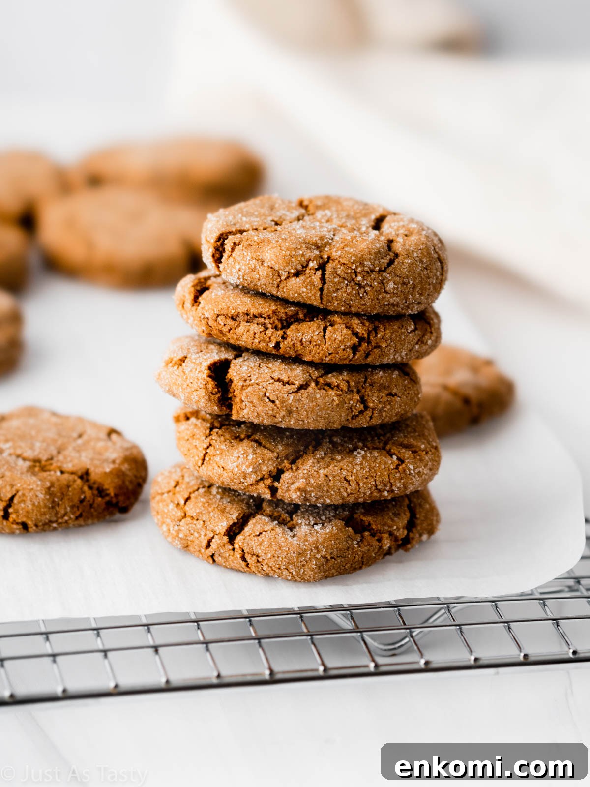 Stack of gluten free gingersnaps on a cooling rack. 