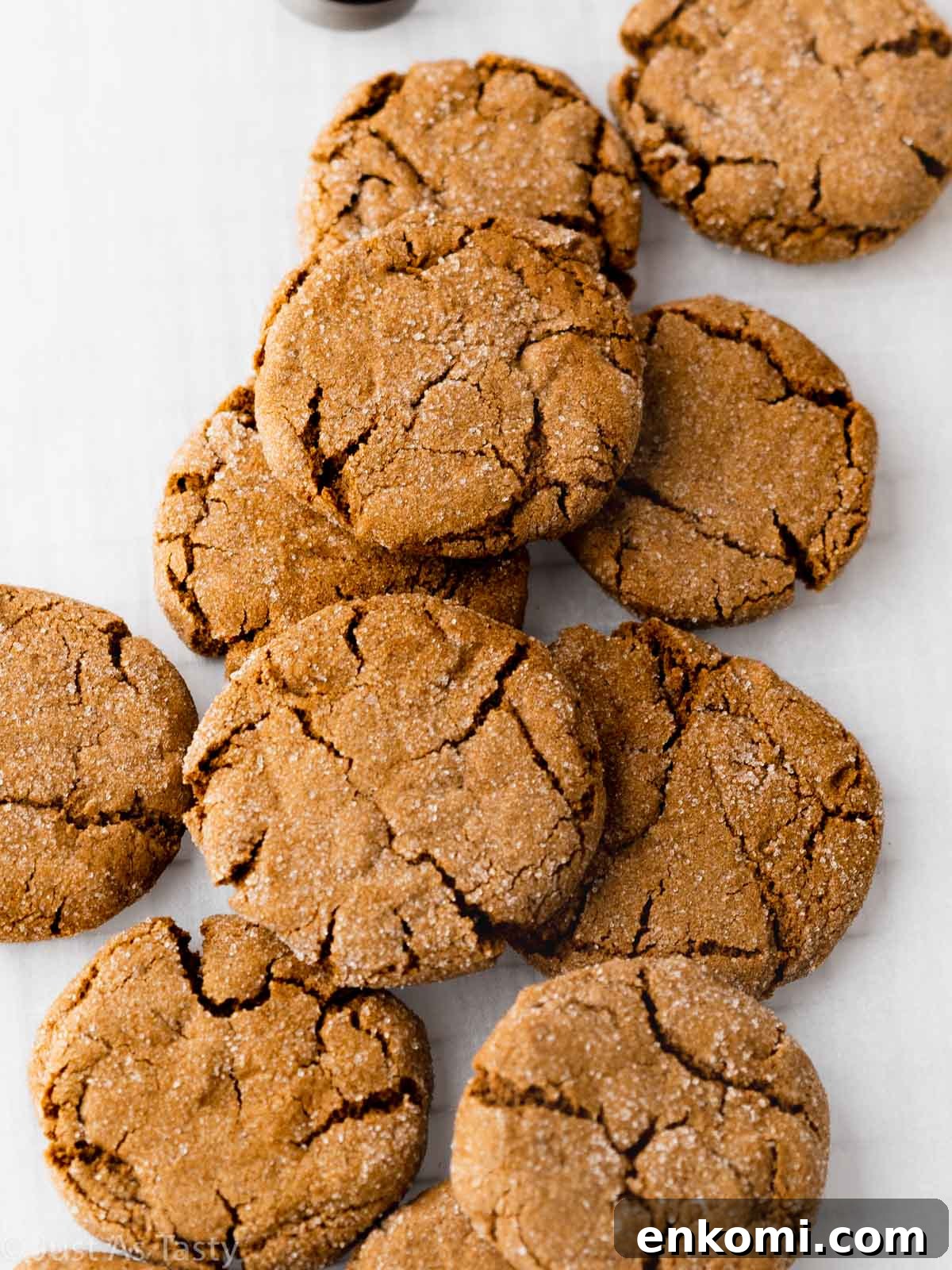 Gluten free gingersnaps on parchment paper. 