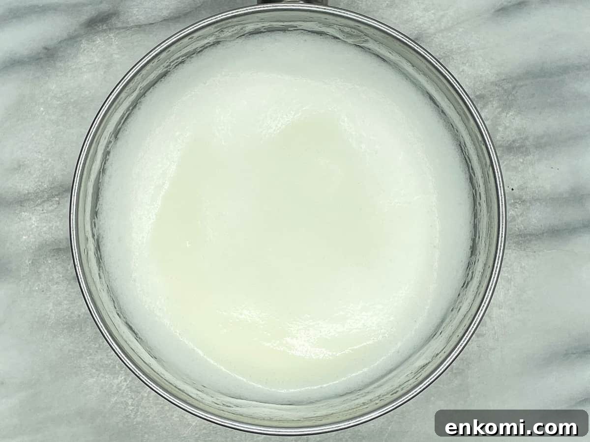 Homemade Condensed Milk Recipe for Rich, Creamy Results 4 Milk sugar mixture in a saucepan
