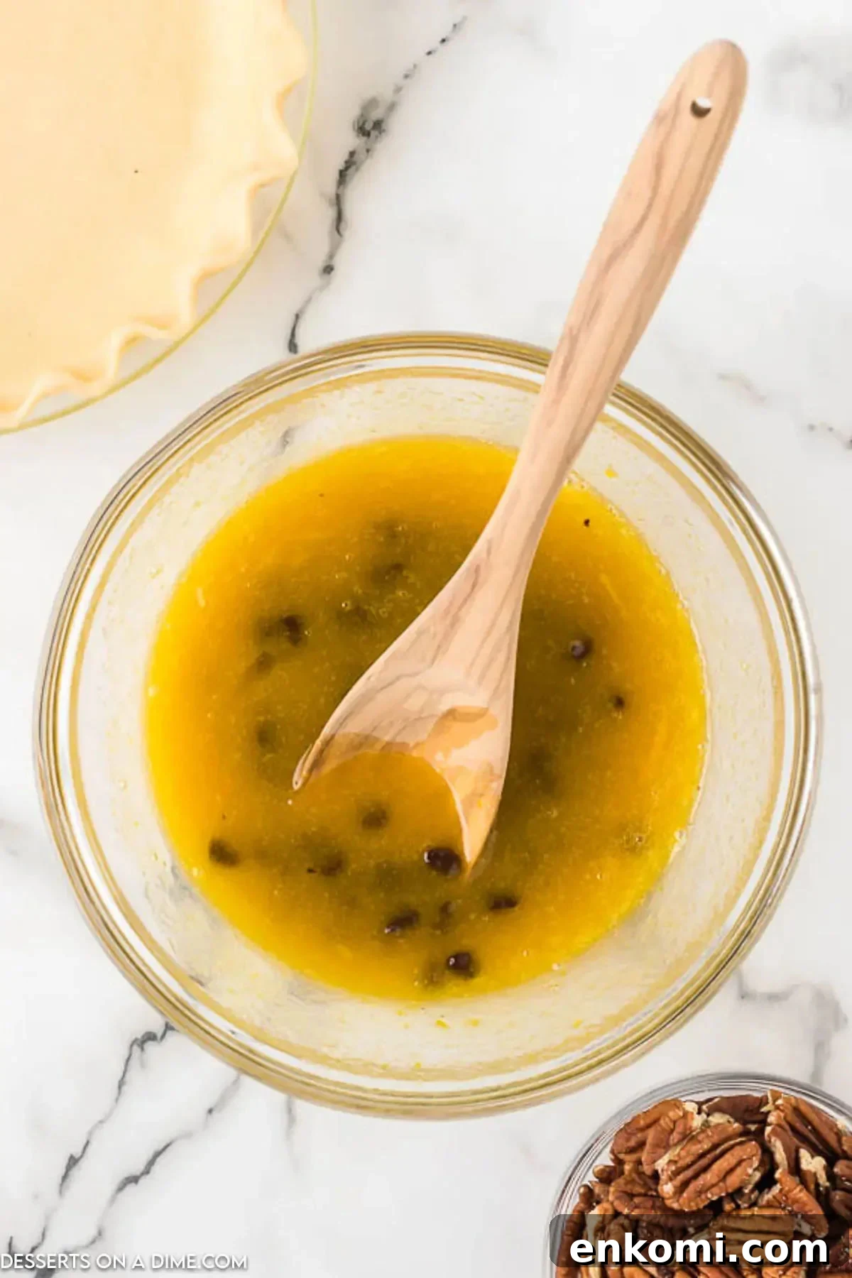 Mixing bowl with eggs and sugar mixture. 