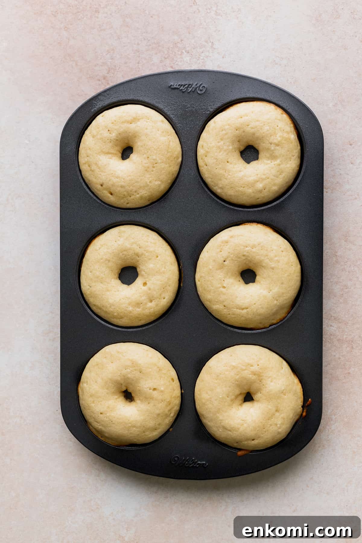 Donuts baked in donut pan.