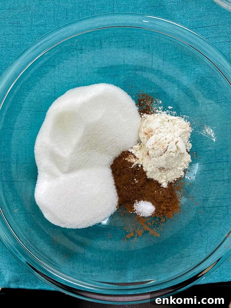 Sugar, cocoa, flour and salt in glass bowl