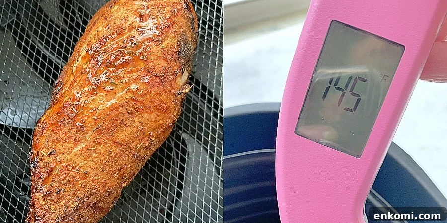 checking temperature of pork tenderloin