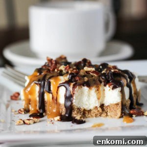 Pecan Turtle Cheesecake Bars have a brown sugar pecan crust & light-textured vanilla cheesecake topped with toasted pecans, chocolate fudge, & caramel.
