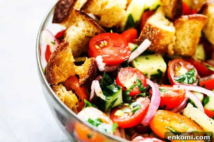 Smoky Chipotle Hummus with Roasted Pine Nuts 10 Summer Panzanella with Garlic Butter Bread - this popular Italian salad is a perfect addition to any summer meal or BBQ. Crusty bread that's been infused with garlic butter makes it irresistible.