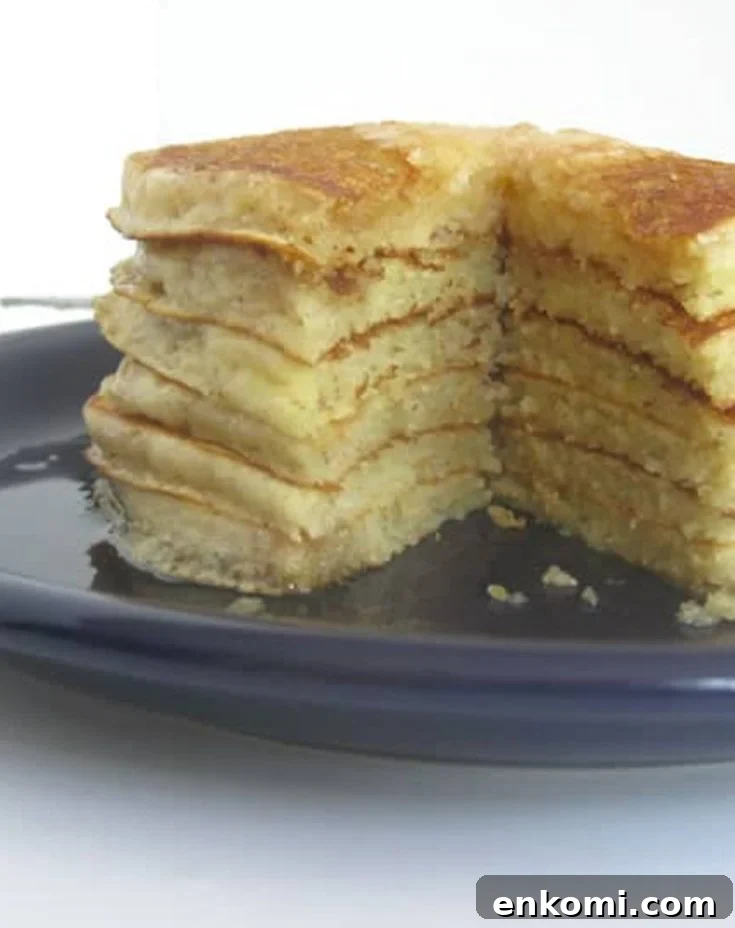 cream of wheat pancakes stacked on a blue plate by themerchantbaker.com