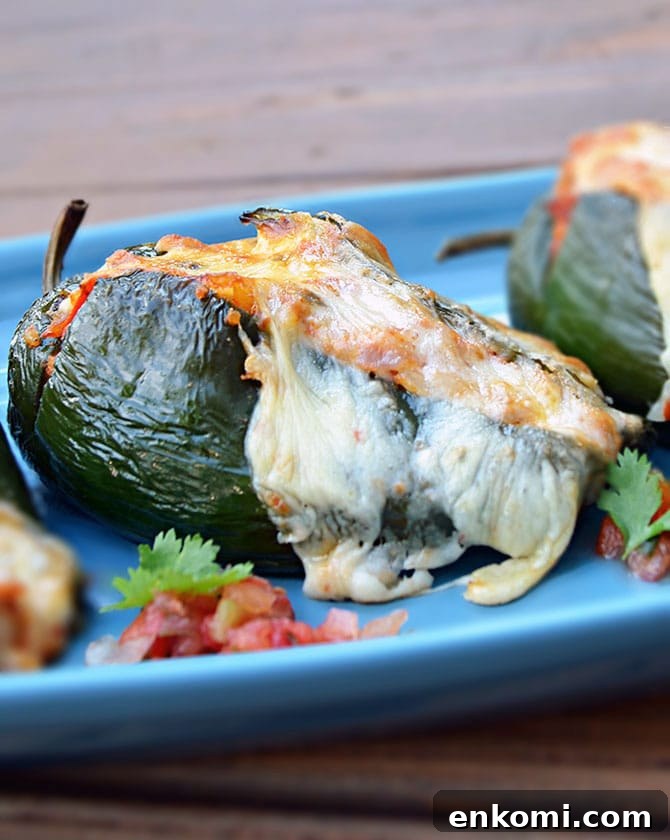 Chorizo-Stuffed Poblano Peppers with Cheese and Tomato Rice 2 Mexican Stuffed Peppers (Chorizo Stuffed Poblanos)
