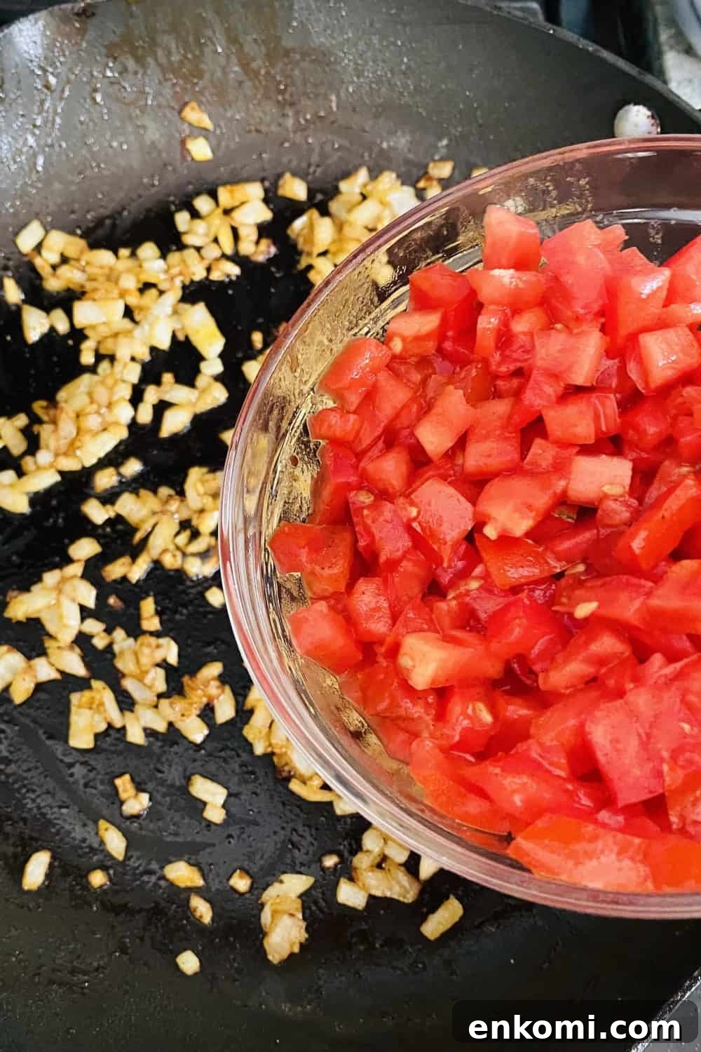 sautéing onions and adding tomatoes