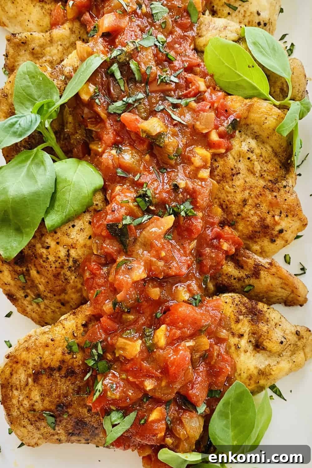 fresh tomato sauce with wine over chicken