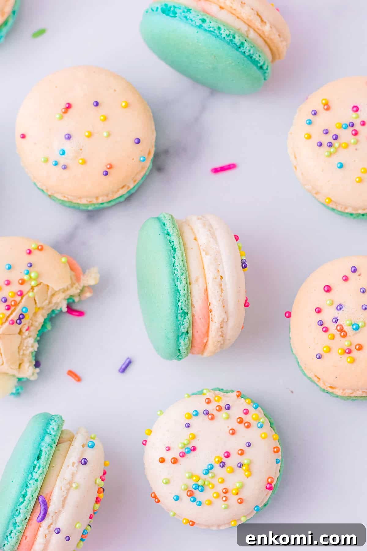 birthday cake macarons on a marble tray