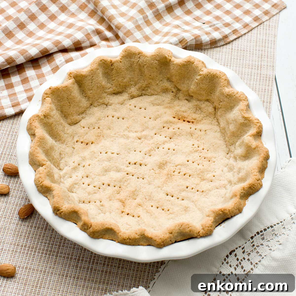 Gluten-Free Levain-Style Chocolate Chip Cookies Recipe 13 A gluten-free almond flour pie crust in a pie plate.