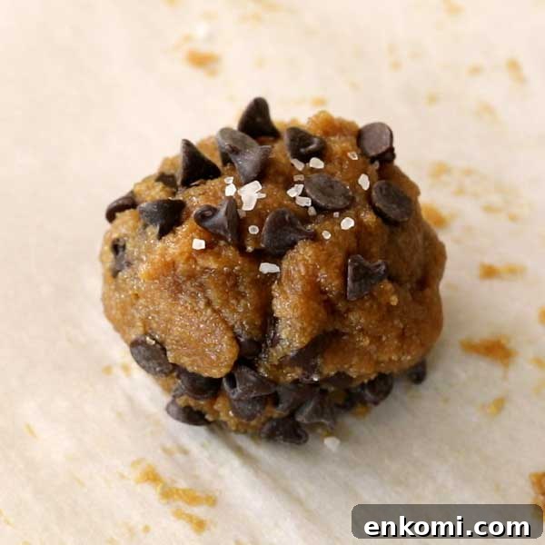 Gluten-Free Levain-Style Chocolate Chip Cookies Recipe 8 Sprinkling salt on top of cookie.