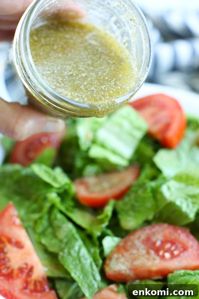 Classic Homemade Italian Dressing Recipe for Salad and Marinade 3 Homemade Italian Salad Dressing recipe pouring from the container