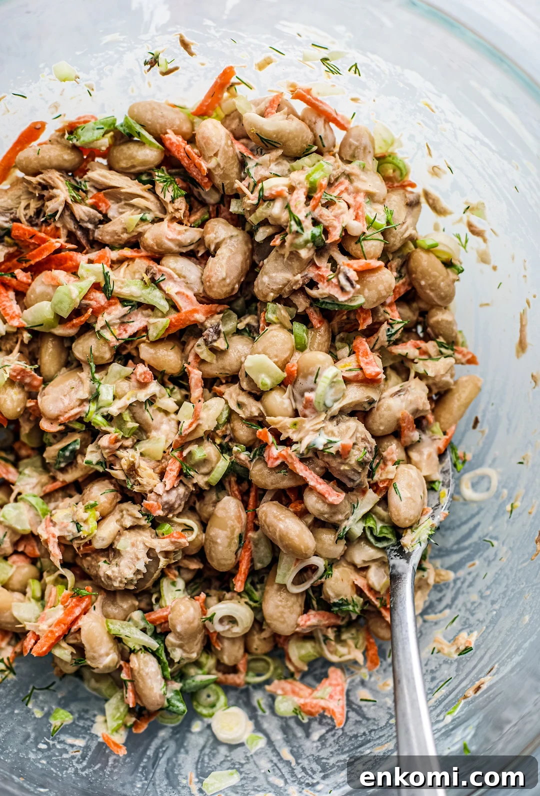 Overhead shot of mixing bowl full of lemon mackerel and white bean salad.