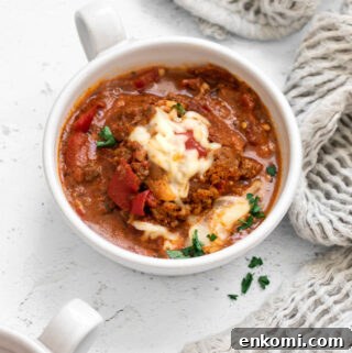 Hearty Pizza Soup Recipe: Comforting One-Pot Dinner 4 Pizza soup with pepperoni in a soup bowl