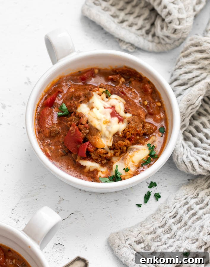 Hearty Pizza Soup Recipe: Comforting One-Pot Dinner 5 Pizza soup with pepperoni in a soup bowl