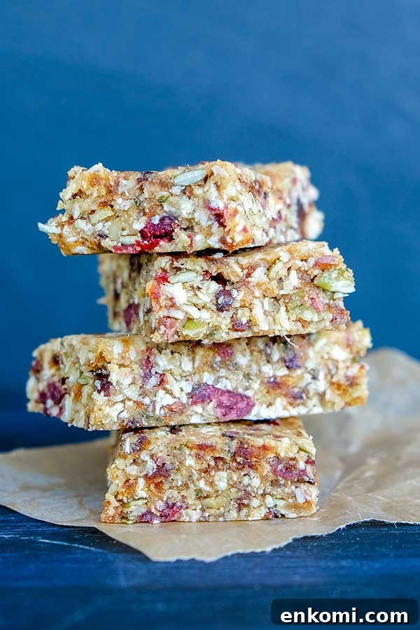 26 Gluten-Free Vegan Recipes for Beginners That Anyone Can Make 4 stacked Pumpkin Seed Cranberry Bars (Gluten-Free, Vegan)