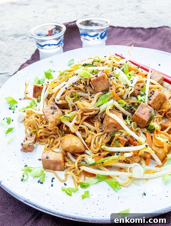 26 Gluten-Free Vegan Recipes for Beginners That Anyone Can Make 5 vegan chow mein with tofu on a plate, gluten free