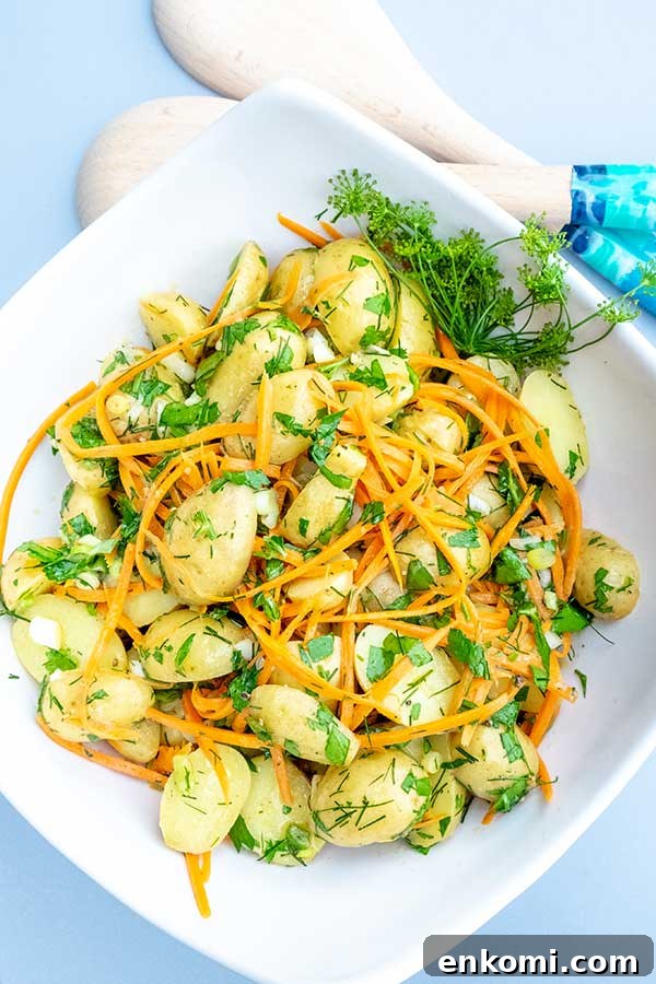 26 Gluten-Free Vegan Recipes for Beginners That Anyone Can Make 6 potato salad with carrots in a bowl, vegan recipe