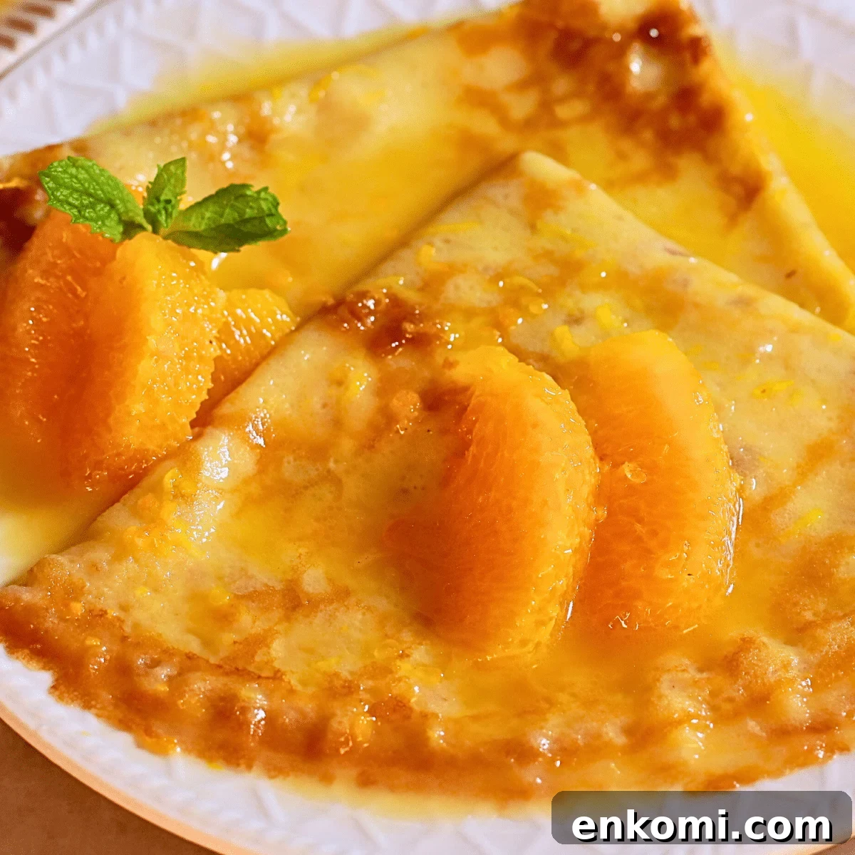 homemade crepes suzette with easy orange butter sauce