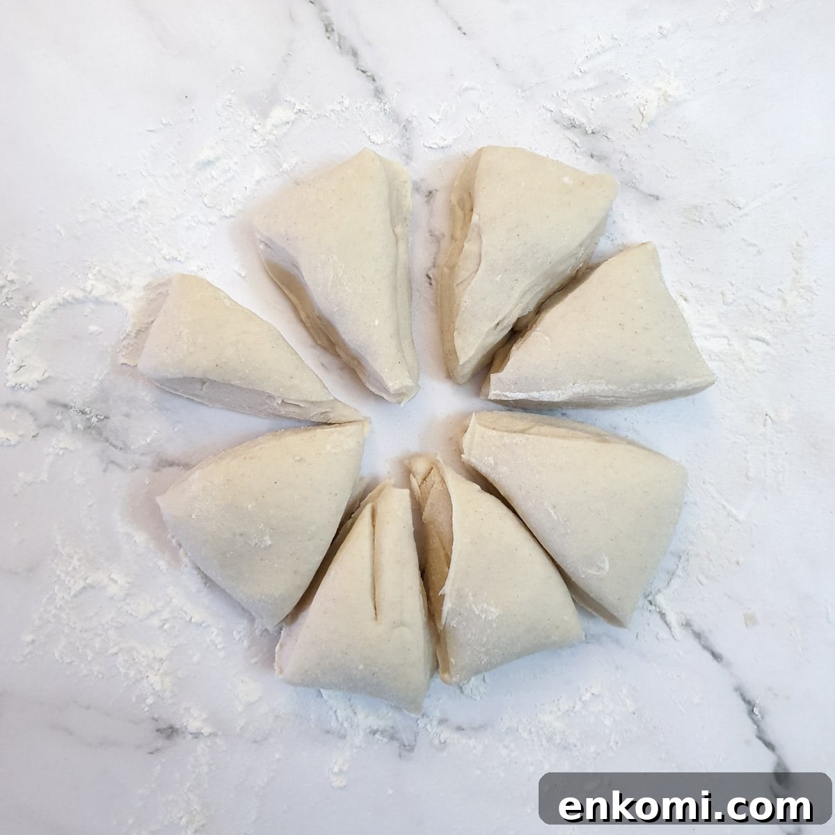A ball of pastry cut into 8 pieces.
