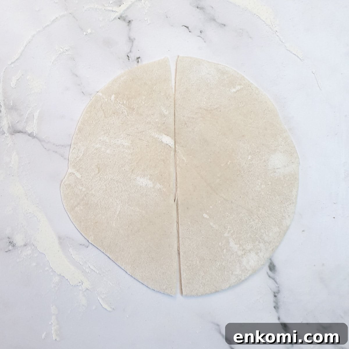 Pastry rolled into a circle and cut in half down the middle.