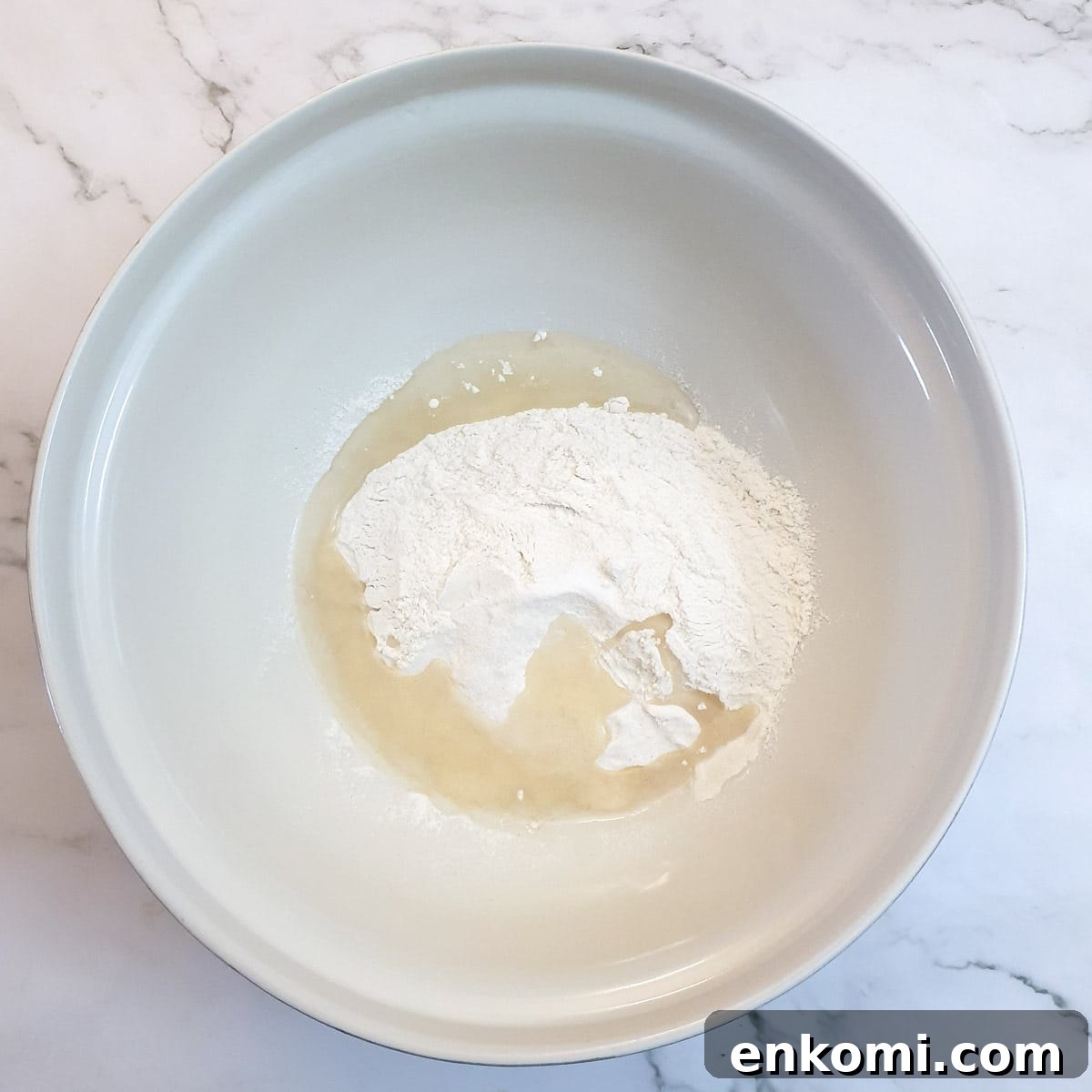 Flour and salt in a large mixing bowl.