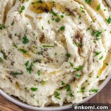Mashed potatoes made with brown butter in bowl.