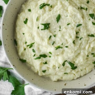 overhead shot of garlic mashed cauliflower in bowl