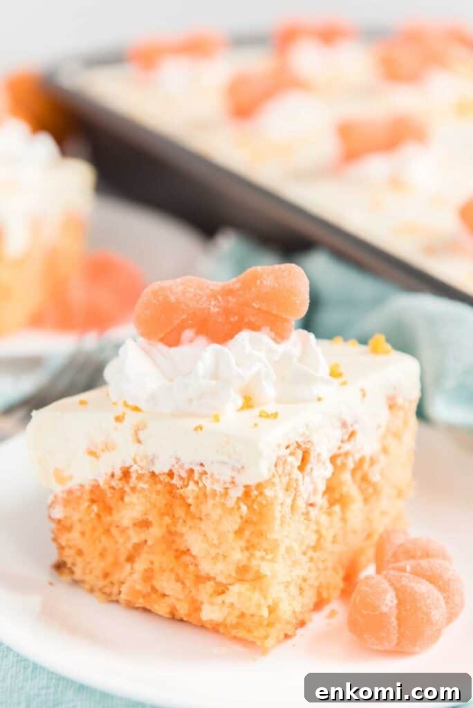 15 Irresistible Poke Cake Recipes to Try Tonight 13 orange creamsicle poke cake on white plate