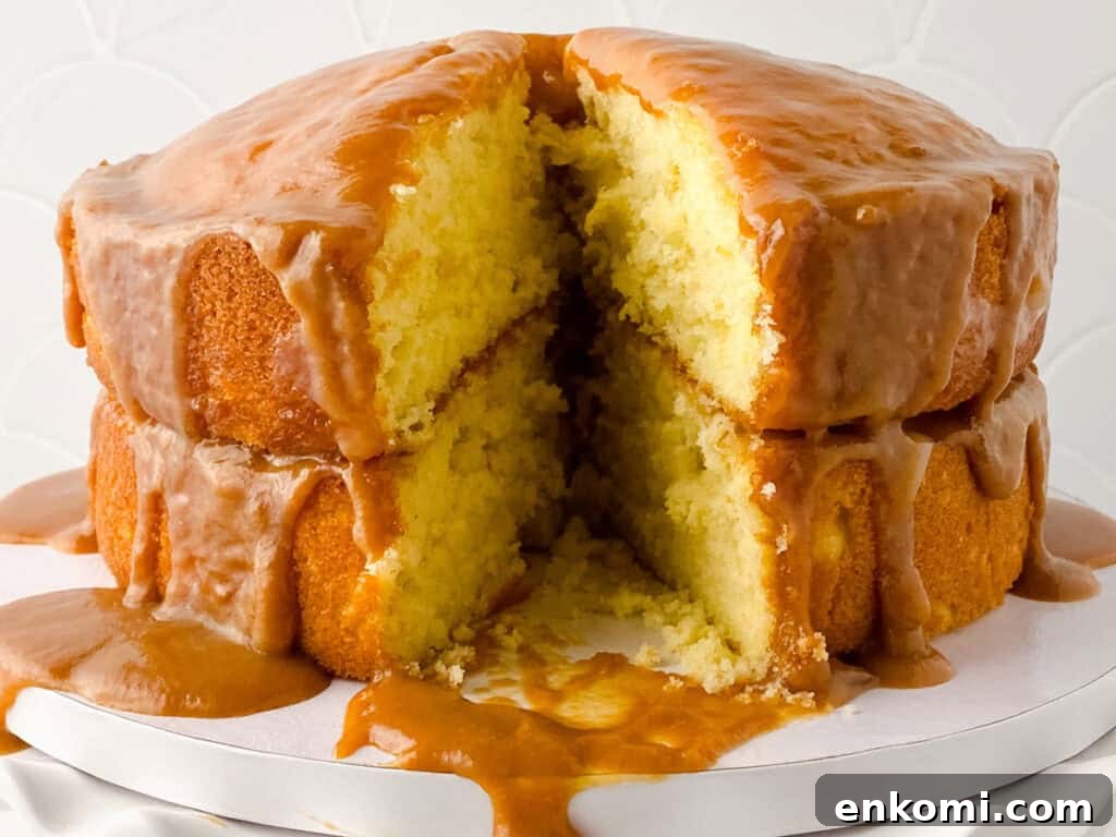 15 Irresistible Poke Cake Recipes to Try Tonight 15 caramel poke cake with slice removed