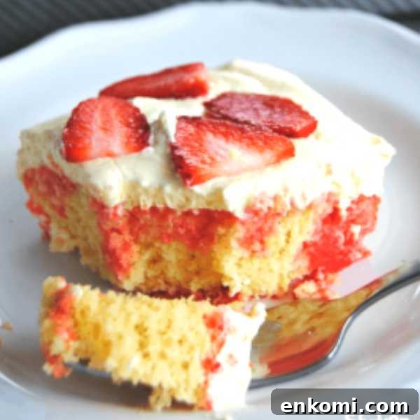15 Irresistible Poke Cake Recipes to Try Tonight 4 lemon strawberry poke cake on white plate topped with sliced strawberries