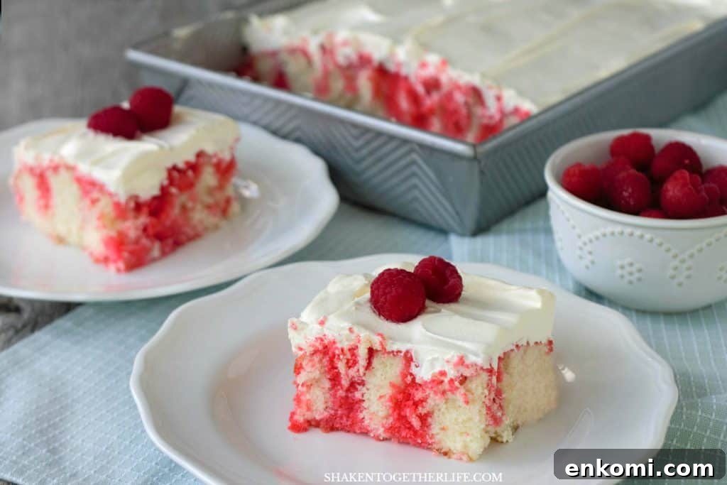 15 Irresistible Poke Cake Recipes to Try Tonight 7 Raspberry Poke Cake pieces on white plates