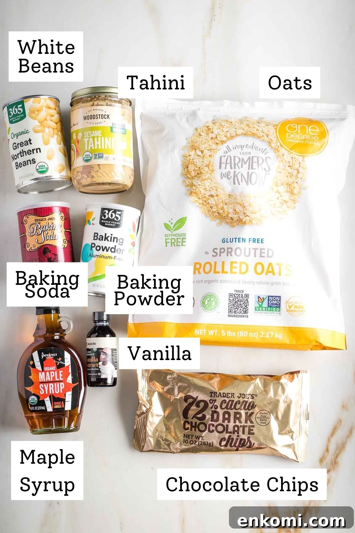 Labeled ingredients: oats, white beans, tahini, baking powder and soda, maple syrup, vanilla and chocolate chips.