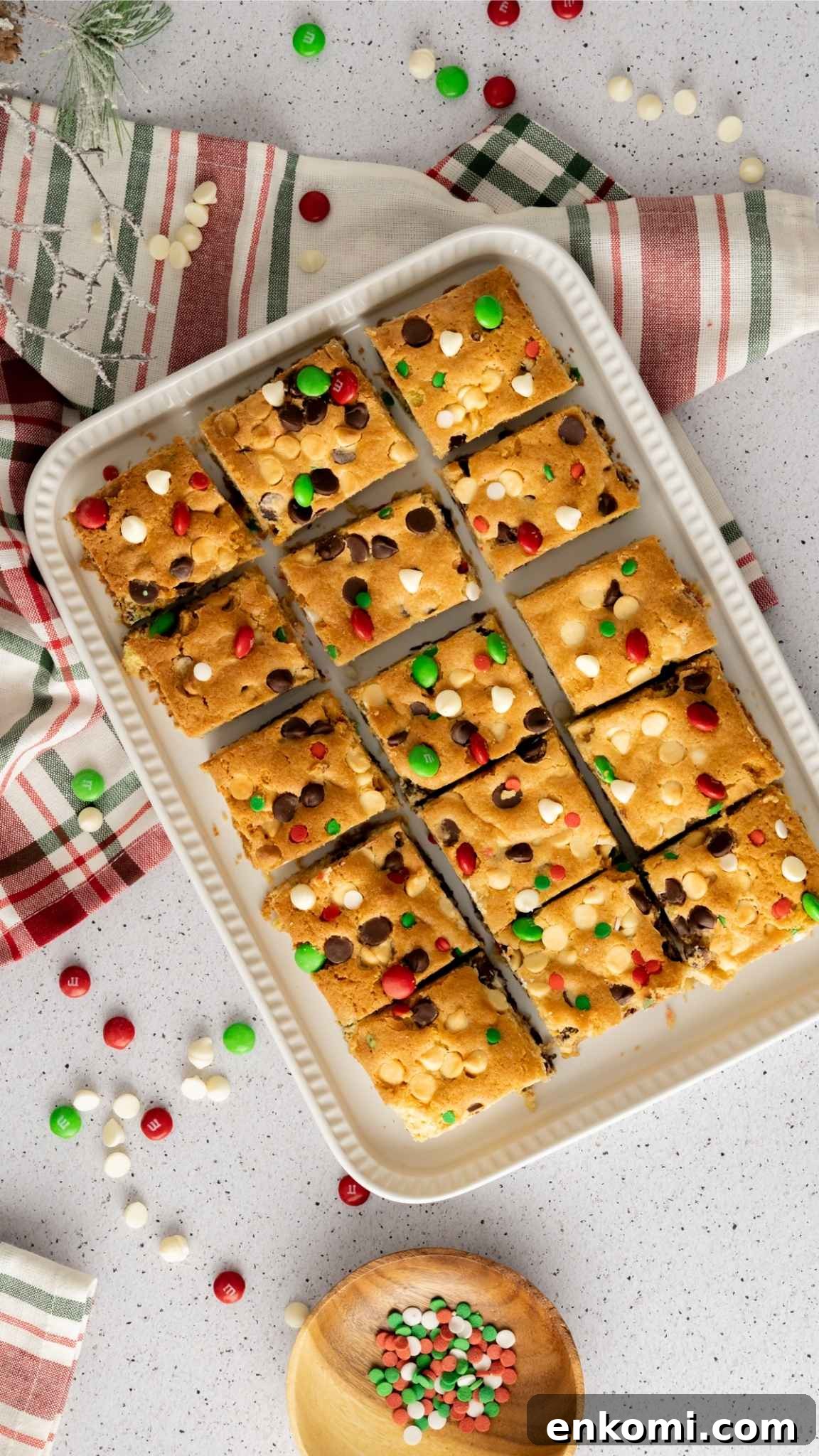 Christmas Sugar Cookie Bars cut and served on an oblong white tray.